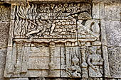 Candi Panataran - Main Temple. Ramayana relief nr 65. Hanuman sets fire to Lanka. 